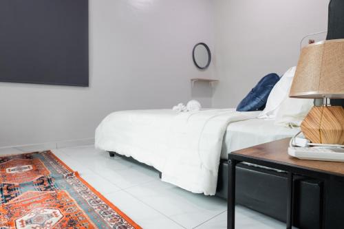 Кровать или кровати в номере Rumahkita Beranang TJS Holiday Homes