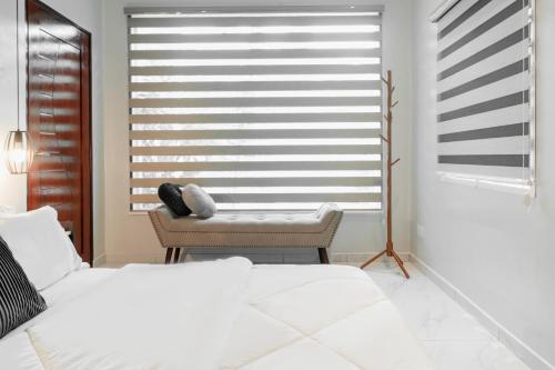 Кровать или кровати в номере Rumahkita Beranang TJS Holiday Homes