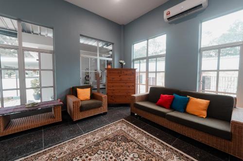 Гостиная зона в Rumahkita Beranang TJS Holiday Homes