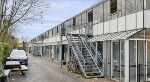 a stairwell on the side of a building at Your Cozy Studio - Just Minutes from Copenhagen Airport in Copenhagen