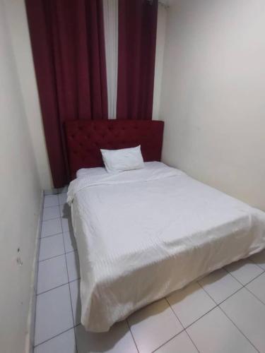 Katil atau katil-katil dalam bilik di Apartment