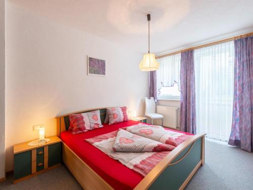 Apartment in Strengen near Ski Slopesにあるベッド