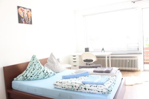 Postel nebo postele na pokoji v ubytování 1 Privatzimmer in Dreizimmer Wohnung Lemgo Innenstadt Ferien Unterkunft