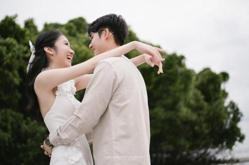 a bride and groom standing next to each other at Bintan Exotica Resort By WH - Free Shuttle BBT Resort BBT - Free Breakfast in Berakit