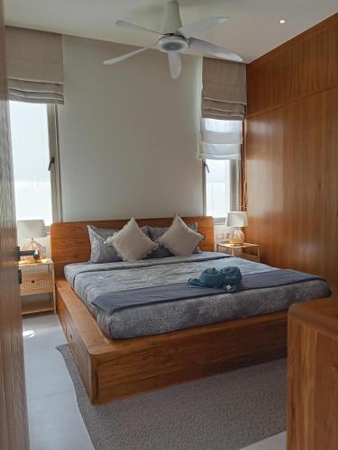 En eller flere senge i et værelse på Luxury Design 3 Bedroom Villa AB2