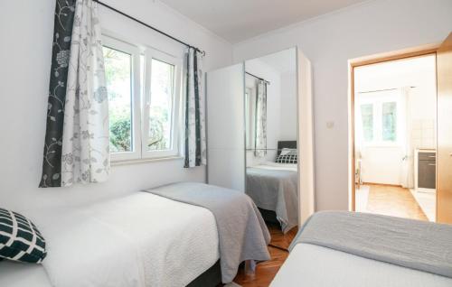 Postel nebo postele na pokoji v ubytování House Rilovic by Villas Guide