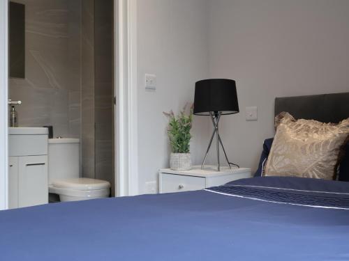Katil atau katil-katil dalam bilik di Walton Suites