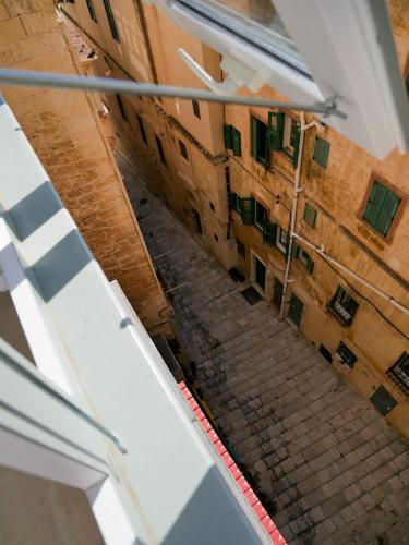 a view of an alley from the top of a building at Battery House in Valletta