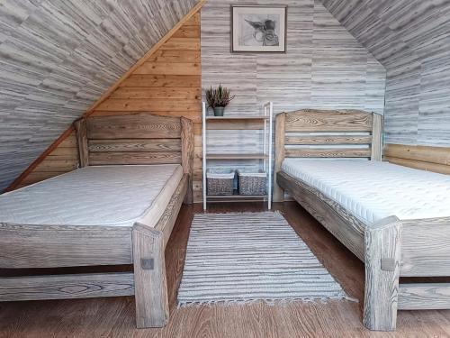 Postel nebo postele na pokoji v ubytování Cozy stay in village