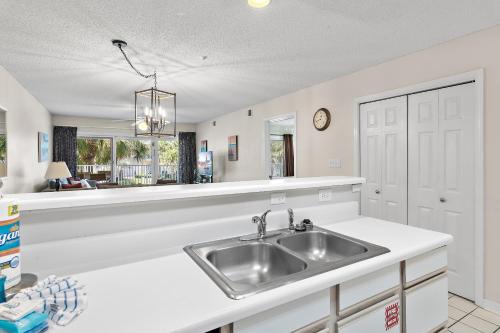 a kitchen with a sink and a counter at Maravilla 3202 in Destin