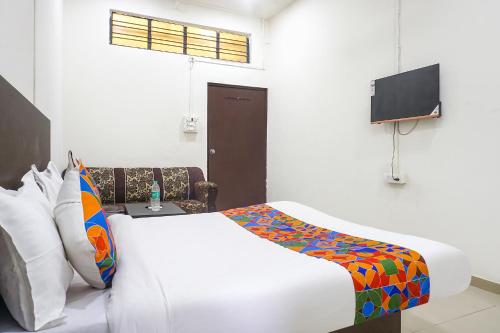 Hotel Om Saiにあるベッド