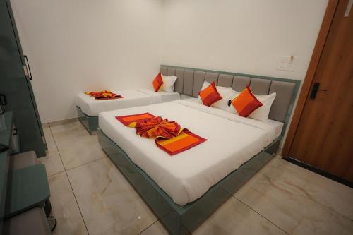 Hotel Shree Leela Palaceにあるベッド