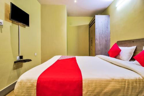 Ένα ή περισσότερα κρεβάτια σε δωμάτιο στο Hotel O Dream Connect Premium