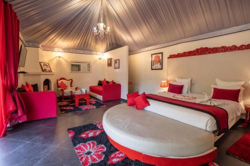 Postel nebo postele na pokoji v ubytování Eden Lodges & SPA-Boutique Hôtel de Luxe