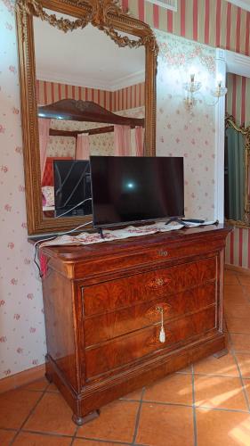 TV a/nebo společenská místnost v ubytování Rome Charm House