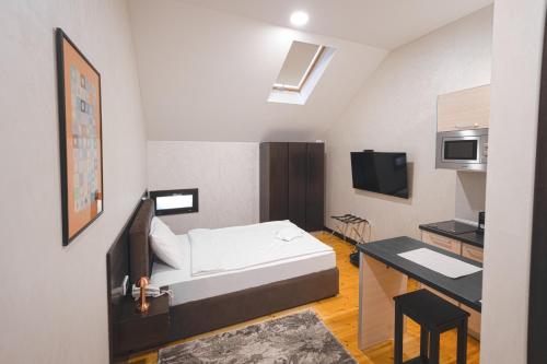 TV/Unterhaltungsangebot in der Unterkunft Apartmani Astral