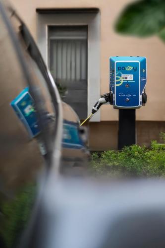 a car is plugged into a gas meter at Grand Hotel Adriatico in Florence