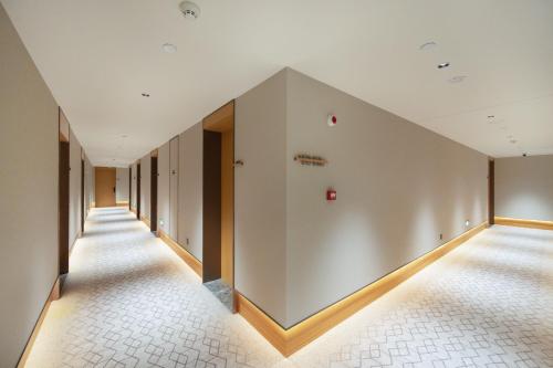 Ji Hotel Beijing Shangdi Zhongguancun Software Parkにあるベッド