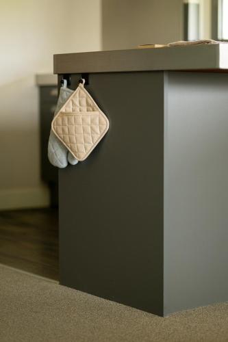 a black counter with a purse on top of it at Vlierijck in Oost-Vlieland