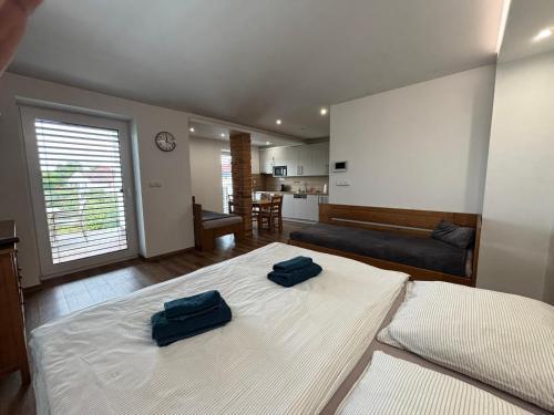 Postel nebo postele na pokoji v ubytování ANICO apartmány