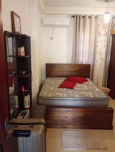 Una cama o camas en una habitación de Rayyan homes