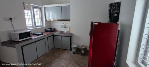 Kuchyň nebo kuchyňský kout v ubytování Genesis Spaces