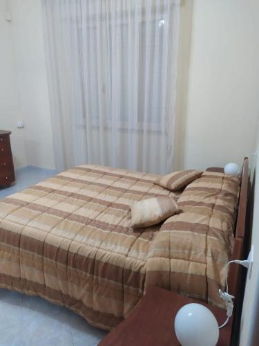 Katil atau katil-katil dalam bilik di Giulianova vacanze