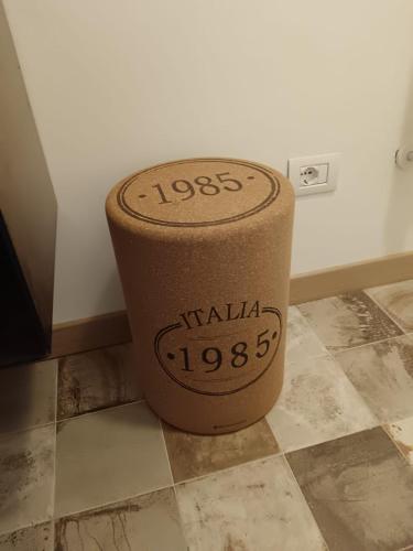 a roll of toilet paper sitting on a floor at Langhe & Wine Accommodation in Neive