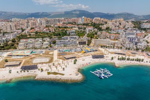 an aerial view of a beach with boats in the water at Apartments and Rooms Villa Erede in Split
