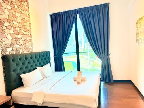 Katil atau katil-katil dalam bilik di Elite Service Suite at Opus Residence Merdeka 118