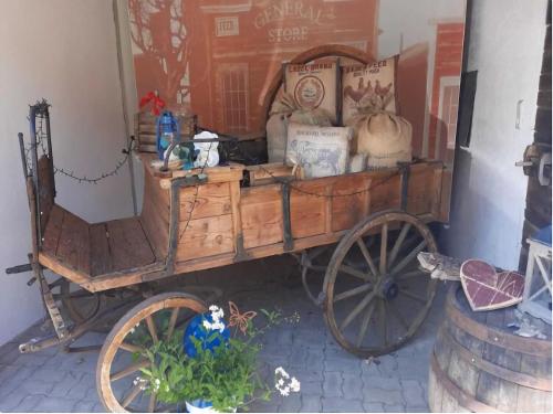 a wooden cart with pumpkins on top of it at Apartment in Neuhaus near Petzen Ski Area in Neuhaus