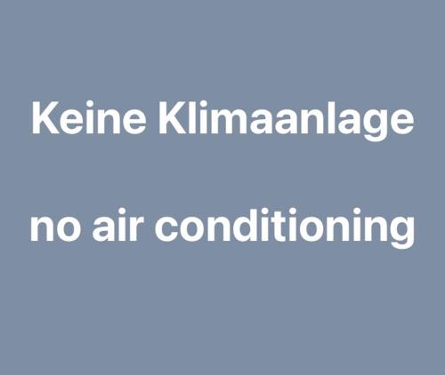 a text box with the words kinekinkinamine no air conditioning at Garni Sternen in Obstalden