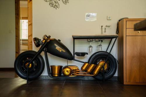 a motorcycle is on display in a room at Chasa Castello relax & spa in Samnaun