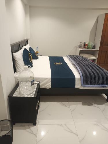 Postel nebo postele na pokoji v ubytování Tabash Hotel, Murree