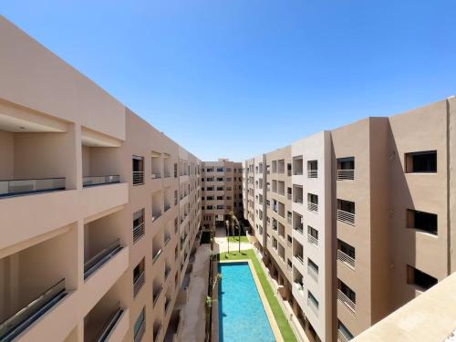 Πισίνα στο ή κοντά στο Charmant Appart , Confort avec balcon et piscine