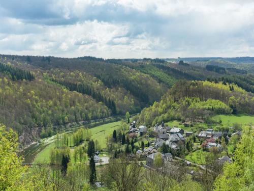 a village in the middle of a valley with trees at Comfort Stay in Carlsbourg in Carlsbourg