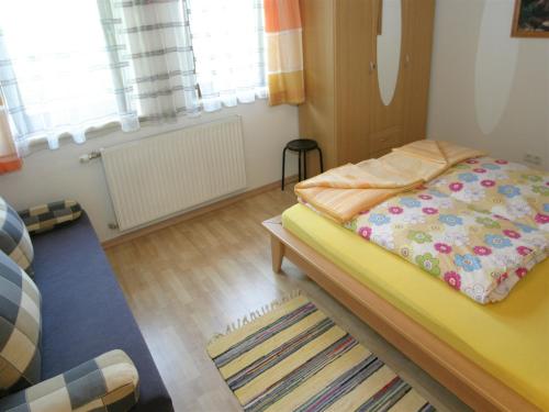 Postel nebo postele na pokoji v ubytování Apartment in Rennweg near Katschberg Ski Area