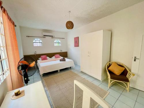 Ένα ή περισσότερα κρεβάτια σε δωμάτιο στο Mont Choisy Lodge - Cactus Apartment
