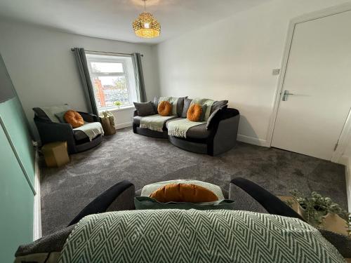 a living room with two couches and a couch at Duke's Retreat - 4 BR Sleeps 8 Ideal 4 Contractors in Consett