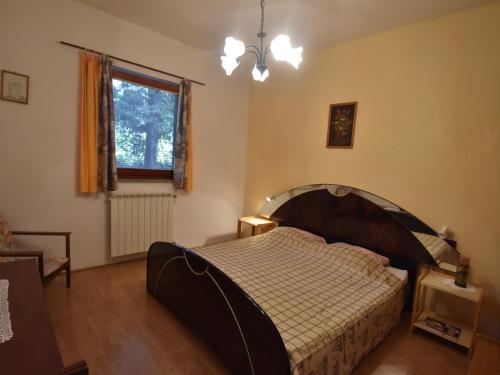 Postel nebo postele na pokoji v ubytování Apartment in Labin near the Beach