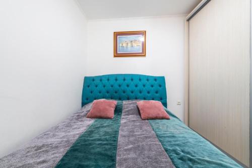 Postel nebo postele na pokoji v ubytování Modern Studio Apartman