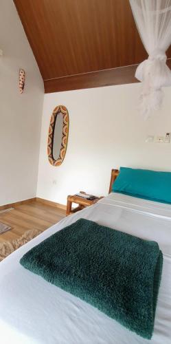 Postel nebo postele na pokoji v ubytování Maison Sigafing