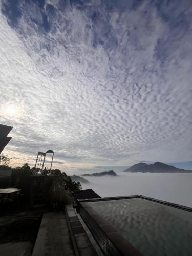 a view of a body of water with a sky at Pinggan Campside Glamping in Baturaja