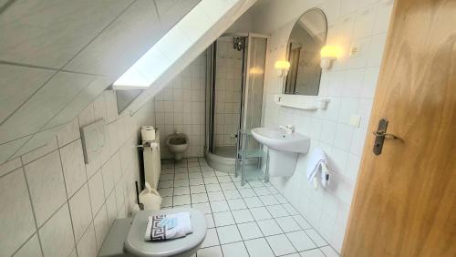 Koupelna v ubytování Komfortable Ferienwohnung in Duhnen Cuxhaven