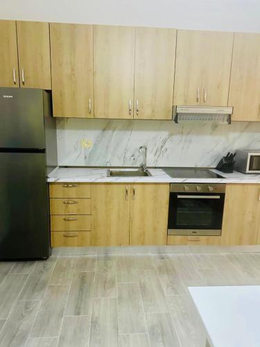 Η κουζίνα ή μικρή κουζίνα στο Ervis Guest House