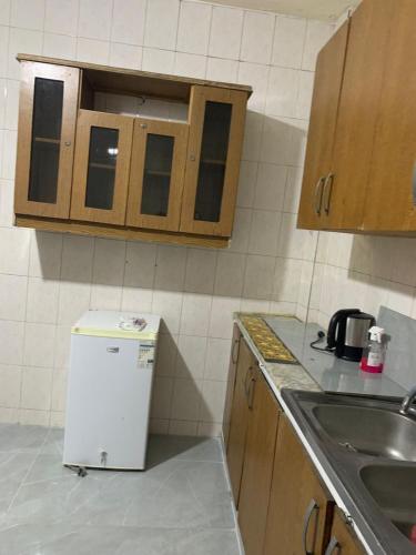 Η κουζίνα ή μικρή κουζίνα στο Affordable Furnished 2BR for Rent