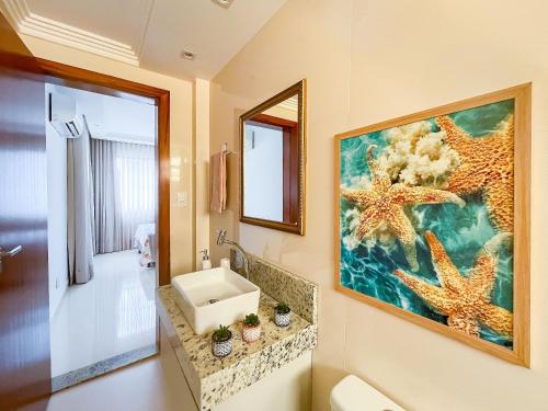 Et badeværelse på Apto MS 3/4 com AR 200m Praia - Orla de Atalaia