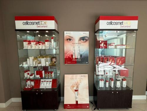 a store with two display cases filled with products at Grand Hôtel du Golf & Palace in Crans-Montana