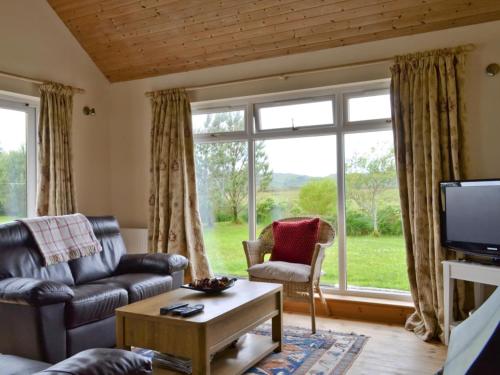TV a/nebo společenská místnost v ubytování Riverview Cottage