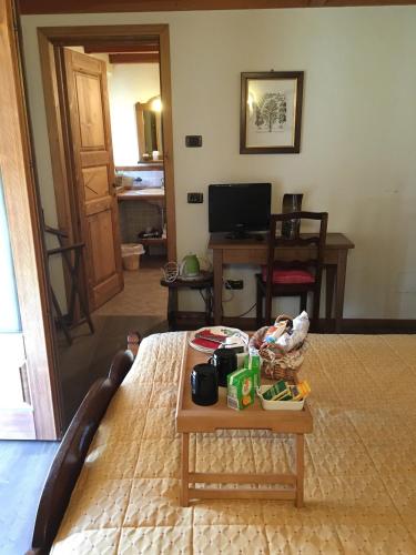 a living room with a coffee table in a room at Maison Colombot in Aosta